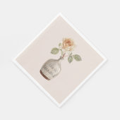 Hübsche Pfirsich-Rosenblume in der Vase Serviette (Ecke)
