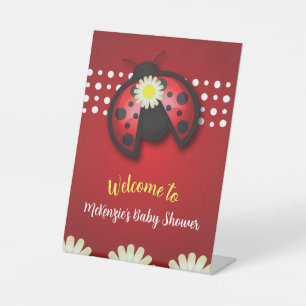 Hübsche Red and Black Ladybug Daisies Baby Dusche Sockelschild