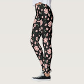 Hübsche rosa Blume auf schwarz Leggings (Links)