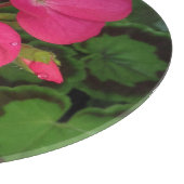 Hübsche Rosa Geranium-Blume mit Waterdropp-Foto Schneidebrett (Ecke)