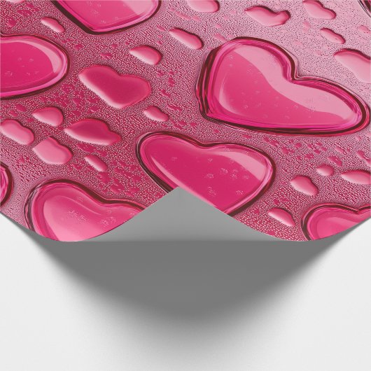Hübsche, rosa, herzenförmige Wassertropfen Geschenkpapier (Ecke)