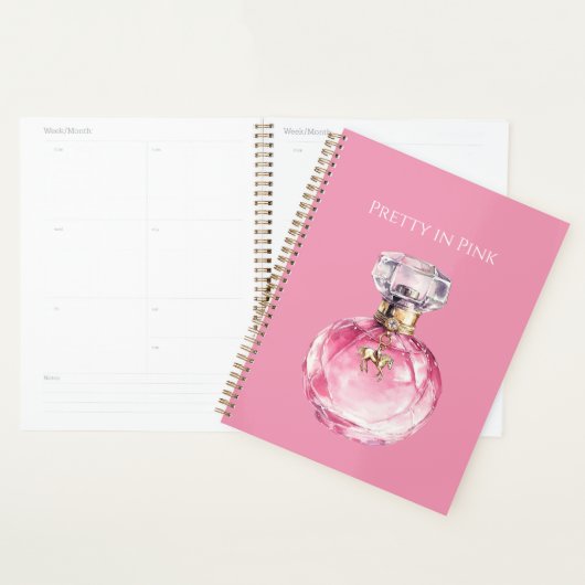 Hübsche rosa Parfümflasche mit goldenem Pferdeanhä Planer (Anzeige)