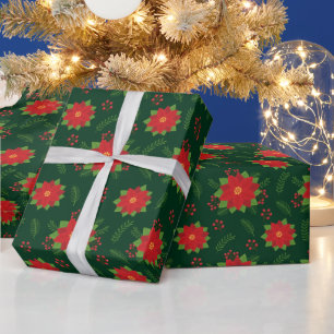 Hübsche rote Winter-Weihnachtsstern auf grünem Mus Geschenkpapier