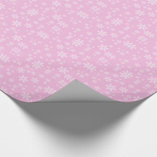 Hübsche Schneeflocken in Rosa und Weiß Geschenkpapier (Ecke)