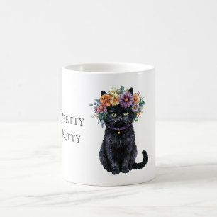 Hübsche schwarze Katze mit Blumen Kaffeetasse