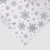 Hübsche Silberschneeflocken auf Winterweiß Seidenpapier (Ausschnitt)