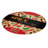 Hübsche würzige, heiße Paprikaschoten, grün Schneidebrett (Ecke)