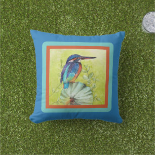 Hübscher bemalter Kolibri auf blau Kissen