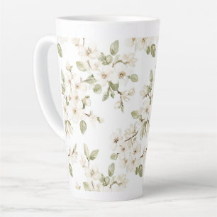 Hübscher cremefarbener blühender Baum Milchtasse