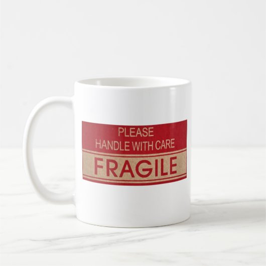 Hübscher Griff mit Sorgfalt, zerbrechliches Zeiche Kaffeetasse (Links)