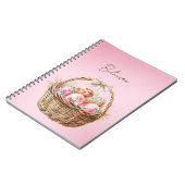 Hübscher rosa Frühlingsblumen-Oster-Eier-Korbbogen Notizblock (Linke Seite)