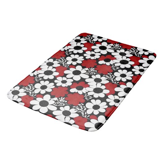 Hübsches Blumenmuster in Rot, Schwarz und Weiß Badematte (Schrägansicht)