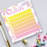 Hübsches, einfaches, blumenrosa, orange gelbes Tuc Notizblock<br><div class="desc">Dieses personalisierte To Do List-Notizblock erlaubt es Ihnen, die Dinge, die Sie jeden Tag tun müssen, behalten. Das Design besteht aus einfachen Blume in lila, rosa und gelb auf weißem Hintergrund und in der Mitte sind sieben leere Bereiche in Rosa, Orange und Gelb für Ihre Aufgaben. Der Text ist vollständig...</div>