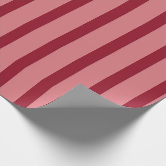 Hübsches rosa und rotes Streifenmuster Geschenkpapier (Ecke)