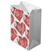 Hugs and Kisses Heart Mittlere Geschenktüte (Vorderseite Schrägansicht)