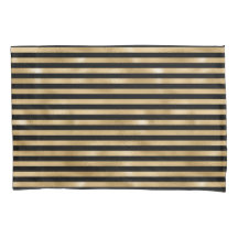 Hüllen aus schwarzem und goldgestrichenem Kissen