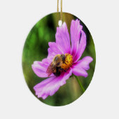 Hummel auf rosa Kosmos Keramik Ornament (Rechts)
