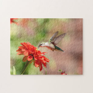 Hummingbird auf einer blühenden Pflanze Puzzle