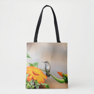 Hummingbird auf einer blühenden Pflanze Tasche