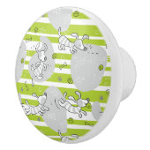 Hund, der Musterhintergrund spielt Keramikknauf (Rechts)