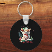 Hund in Weihnachtshut mit Büchern - Ein perfekter Schlüsselanhänger (Vorderseite)