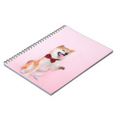 Hund mit einem Bow-Notebook Notizblock (Linke Seite)