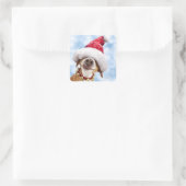 Hund mit großer Weihnachtsmannmütze Quadratischer Aufkleber (Tasche)