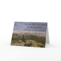 Hund und Frau auf einem Rocky Bluff