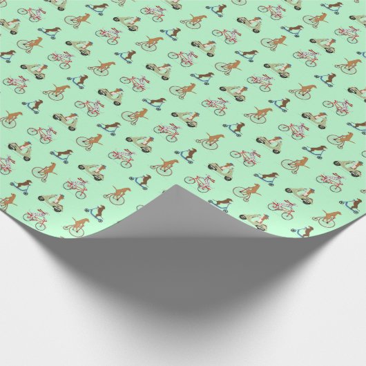 Hunde auf Fahrrädern und Scootern - grün Geschenkpapier (Ecke)