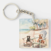 Hunde in Adirondack Stühlen am Küstenstrand