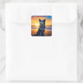 Hunde sitzen am Ocean Beach bei Sunset Quadratischer Aufkleber (Tasche)