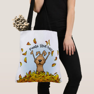 Hunde spielen in einem Pile von Herbstlauben - Nie Tasche