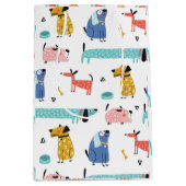 Hunde und Regenbogen farbiges Muster Mittlere Geschenktüte (Vorderseite)