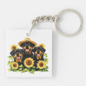 Hunde von Rottweiler, umgeben von Sonnenblumen Schlüsselanhänger (Rückseite)