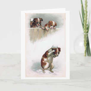 "Hunde, welche die Schneebälle" Vintag spielen Feiertagskarte