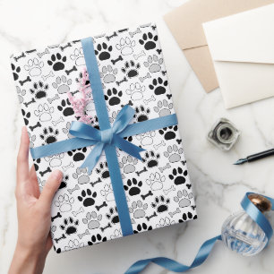Hundepfotenabdrücke und Knochenmuster Geschenkpapier