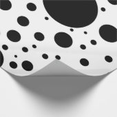 Hunderte von den schwarzen Flecken und von den Geschenkpapier (Ecke)