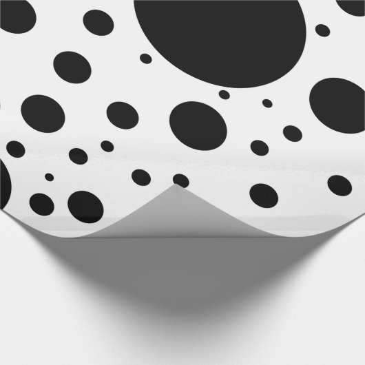 Hunderte von den schwarzen Flecken und von den Geschenkpapier (Ecke)