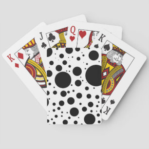 Hunderte von schwarzen Punkten und Kreisen in unte Spielkarten