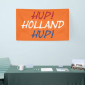 Hup Holland Hup überlagerte sich auf NLD Flag auf Banner (Messeveranstaltung)