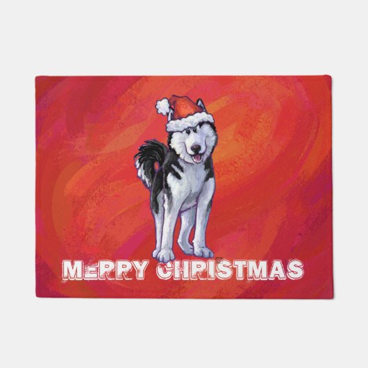 Husky in Weihnachtsmannmütze auf Rot Fußmatte (Vorderseite)