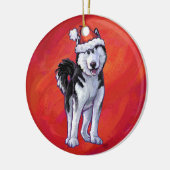 Husky in Weihnachtsmannmütze auf Rot Keramik Ornament (Links)