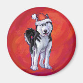 Husky in Weihnachtsmannmütze auf Rot Magnet (Vorne)
