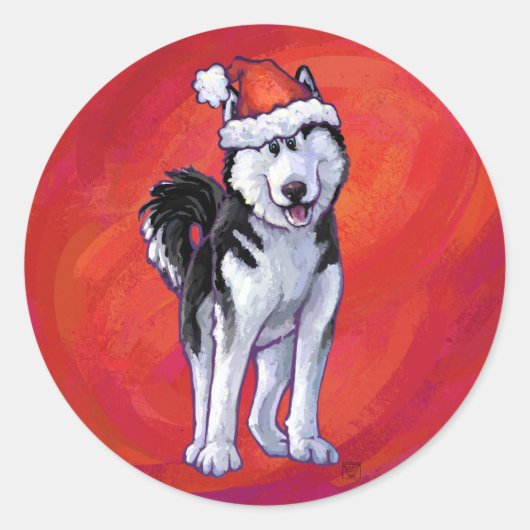 Husky in Weihnachtsmannmütze auf Rot Runder Aufkleber (Vorderseite)