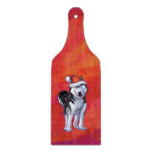 Husky in Weihnachtsmannmütze auf Rot Schneidebrett (Vorderseite)