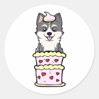 Husky springt aus einem Kuchen Runder Aufkleber