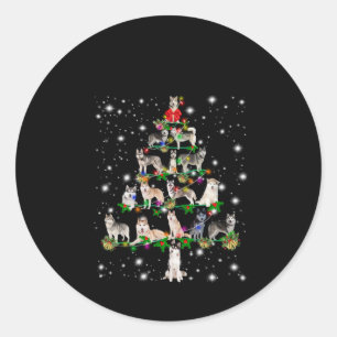 Husky Weihnachtsbaum mit leuchtendem Licht bedeckt Runder Aufkleber