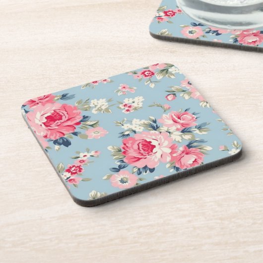 Hütte Rosa Rosen auf blauem Hintergrund Getränkeuntersetzer (Linke Seite)