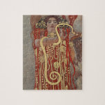 Hygieia von Gustav Klimt, Vintager Jugendstil Puzzle<br><div class="desc">Hygieia (c. 1901) von Gustav Klimt ist ein Vintages Viktorianisches Zeitenymbolismus-Gemälde, in dem die griechische Göttin aus Hygiene, Gesundheit, Sauberkeit und Sanitäreinrichtungen sowie die askulapische Schlange um ihren Arm und die Tasse Lethe in ihrer Hand dargestellt wird. Hygieia ist Teil eines von drei Gemälden, die als "Gemälde der Fakultät" bekannt...</div>