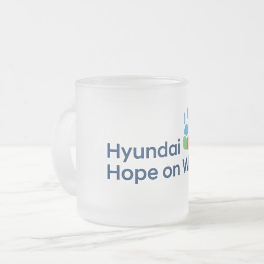 Hyundai Hope on Wheels mattierte Kaffeetasse (Vorderseite Links)